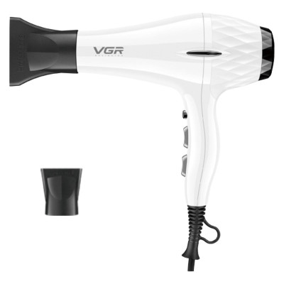 سشوار حرفه‌ای 2200 وات وی جی ار مدل V-413، موتور AC، وزن 802 گرم، المنت سرامیک تورمالین، دارای سری متمرکز‌کننده باریک، متمرکز‌کننده پهن با ویژگی صاف‌کنندگی، حجم‌دهندگی، با قابلیت باد سرد