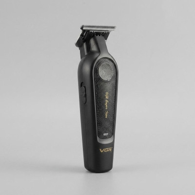 ماشین اصلاح موی سر و صورت وی جی آر مدل V-995 با تیغه کربن استیل، باتری لیتیوم یون 2000 میلی‌آمپر ساعت، شارژ USB، قابلیت تنظیم سرعت و طراحی ارگونومیک و سبک