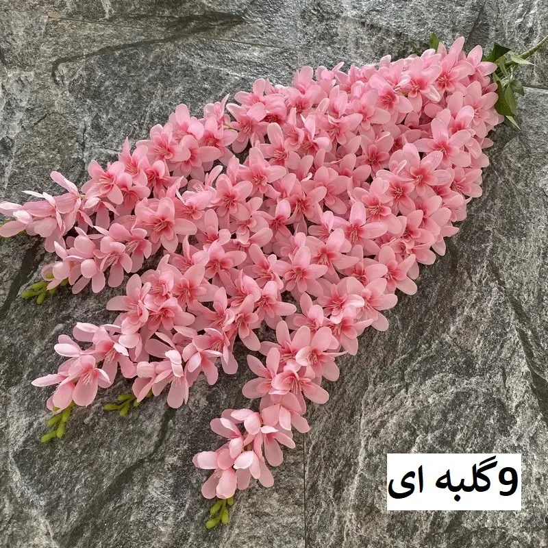 گل مصنوعی آویز ارکیده 5 شاخه قابل تنظیم، مناسب فضای باز و گل‌های آپارتمانی، نصب دیواری و آویزی، ابعاد 85x23x5 سانتی‌متر، وزن 110 گرم، کد A09