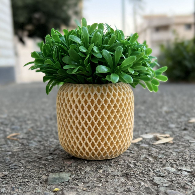 گلدان به همراه گل مصنوعی طرح برگ میخک، مدل زنبوری S52، جنس پودر سنگ و رزین، ابعاد 10×8×12 سانتی‌متر، وزن 300 گرم