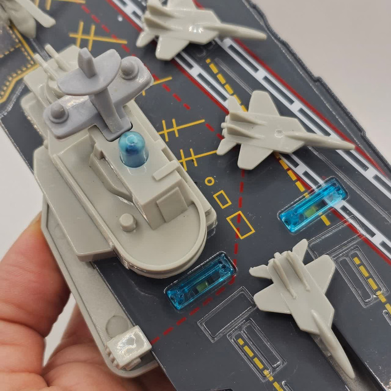ناو هواپیمابر ناب سل مدل فلزی چراغدار موزیکال کد The Musical Lighted Aircraft Carrier به همراه 4 عدد هواپیما و یک عدد هلیکوپتر