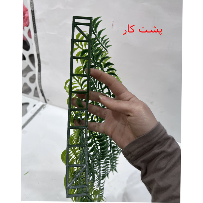 گل مصنوعی دیوارپوش سرخس با ابعاد 25x10x50 سانتی‌متر و وزن 100 گرم