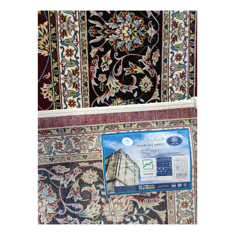 فرش ماشینی 700 شانه مشهد زمینه لاکی حاشیه سرمه ای طرح افشان کد 722002
