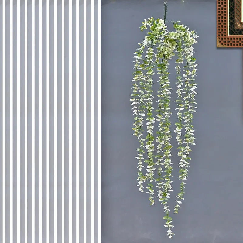 گل مصنوعی آویز شمشاد برفی پلاستیکی ابعاد 70×20×20 سانتی‌متر سبک و قابل نصب در دکوراسیون داخلی و بیرونی