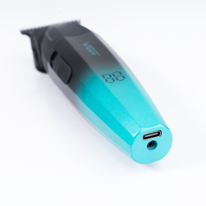 ماشین اصلاح موی سر و صورت وی جی آر مدل V-906 با تیغه سرامیکی پوشش DLC، موتور 9000 دور در دقیقه، باتری 2000 میلی‌آمپر ساعت با 240 دقیقه عمر شارژ، صفحه نمایش LED، طراحی ارگونومیک و مقاوم، قابلیت صفرزن، خط زن و حجم زن