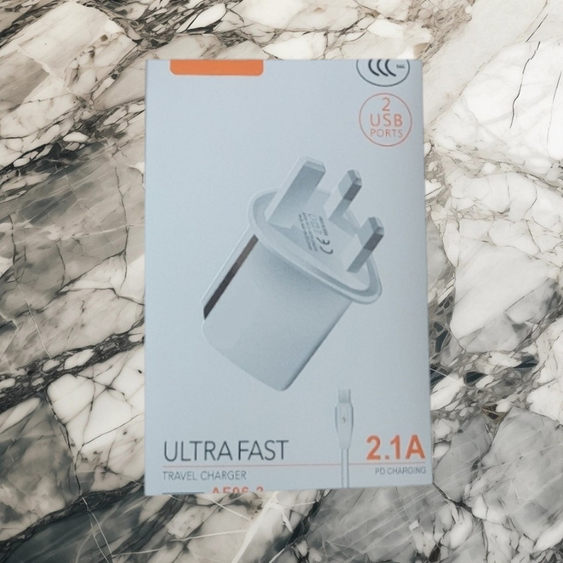 شارژر دیواری 10.5 وات مدل 2.1A) به همراه کابل تبدیل MICROUSB