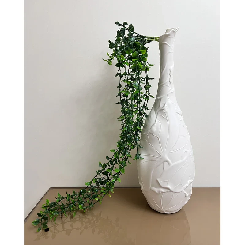 گل مصنوعی برگدار با ابعاد 90×20×10 سانتی‌متر و وزن 100 گرم