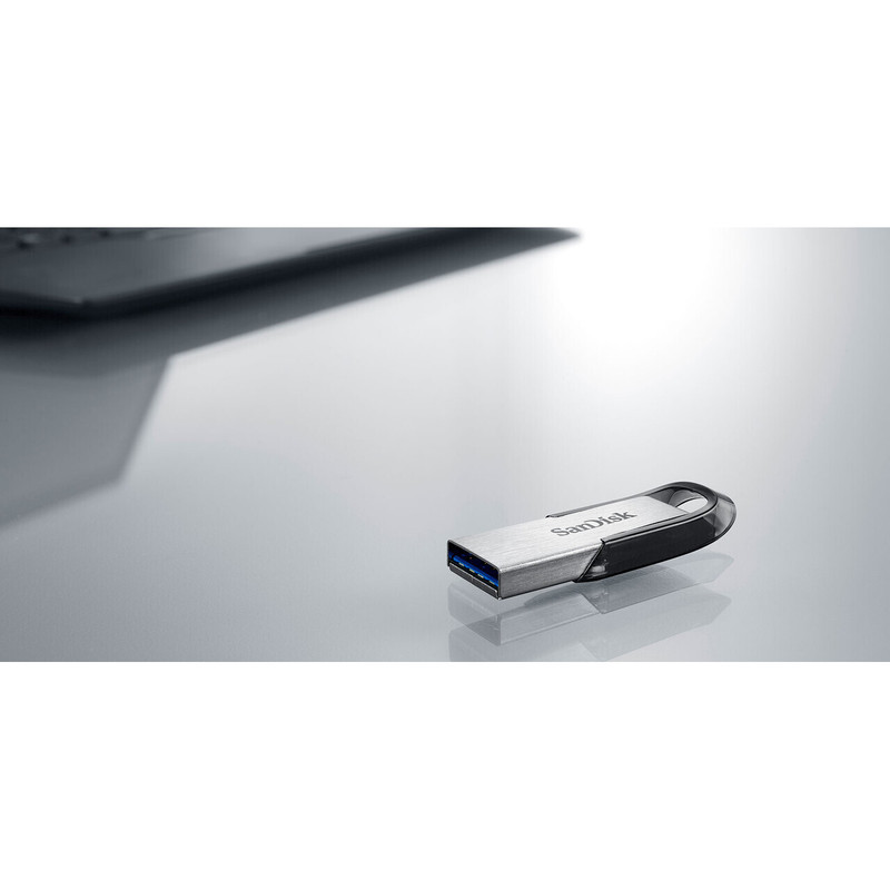 فلش مموری سن دیسک Ultra Flair CZ73 ظرفیت 64 گیگابایت با رابط USB 3.0 و بدنه فلزی مقاوم، سرعت انتقال 150 مگابایت بر ثانیه و سازگار با انواع سیستم‌عامل‌ها و دستگاه‌ها