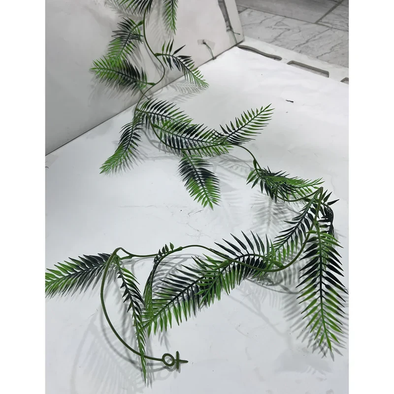 گل مصنوعی با ریسه سوزنی مناسب دکوراسیون، ابعاد 180×10×10 سانتی‌متر، وزن 100 گرم