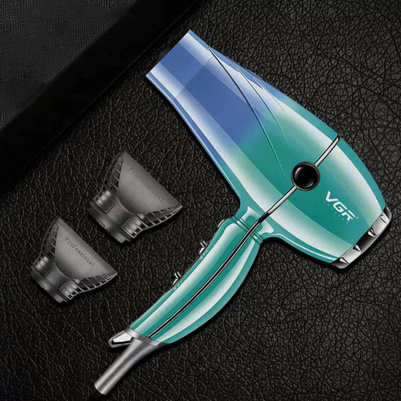 سشوار حرفه‌ای 2000 وات وی جی ار مدل V-452، موتور AC، وزن 900 گرم، دارای سری متمرکز‌کننده باریک با ویژگی صاف‌کنندگی، حجم‌دهندگی، با قابلیت باد سرد