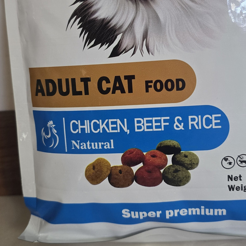 غذا خشک گربه بالغ ریلکسی مدل مولتی کالر طعم مرغ و برنج و گوشت وزن 2 کیلوگرم