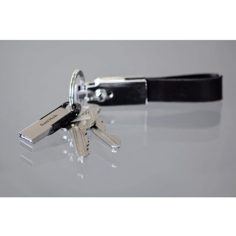 فلش مموری سن دیسک Ultra Flair CZ73 ظرفیت 64 گیگابایت با رابط USB 3.0 و بدنه فلزی مقاوم، سرعت انتقال 150 مگابایت بر ثانیه و سازگار با انواع سیستم‌عامل‌ها و دستگاه‌ها