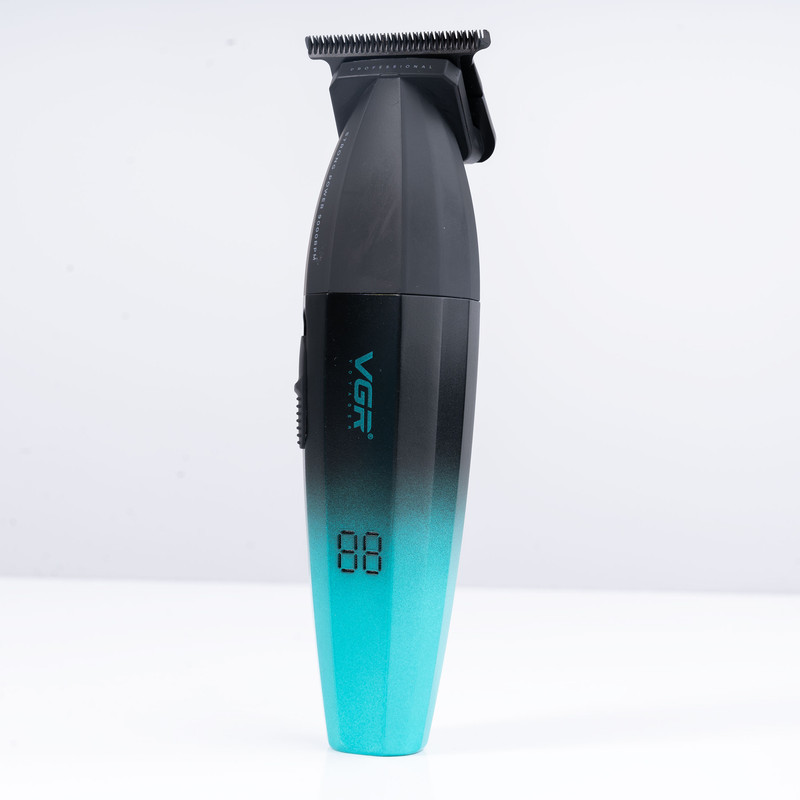 ماشین اصلاح موی سر و صورت وی جی آر مدل V-906 با تیغه سرامیکی پوشش DLC، موتور 9000 دور در دقیقه، باتری 2000 میلی‌آمپر ساعت با 240 دقیقه عمر شارژ، صفحه نمایش LED، طراحی ارگونومیک و مقاوم، قابلیت صفرزن، خط زن و حجم زن