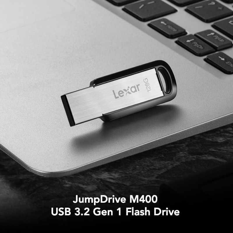 فلش مموری لکسار مدل M400 ظرفیت 128 گیگابایت رابط USB 3.0 مقاوم در برابر ضربه و سازگار با سیستم‌های PC و Mac