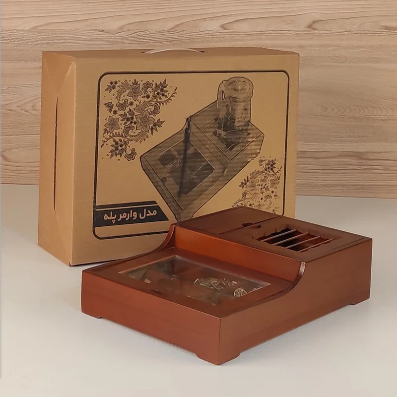 جعبه پذیرایی تی بگ وارمر پله کد 1، جنس MDF، مناسب گرم نگهداشتن دمنوش و چای، دارای 6 پارت کوچک برای تنقلات و چای و 1 پارت بزرگ برای نبات و نسکافه