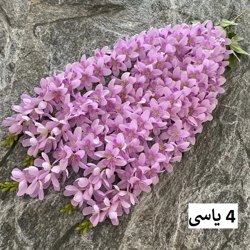 گل مصنوعی مدل آویز ارکیده با 5 شاخه گلدار، قابل تنظیم، قابل شستشو و انعطاف پذیر، مناسب فضای باز و گل‌های آپارتمانی با نصب دیواری، آویزی و ایستاده، ابعاد 85x23x5 سانتی‌متر و وزن 110 گرم