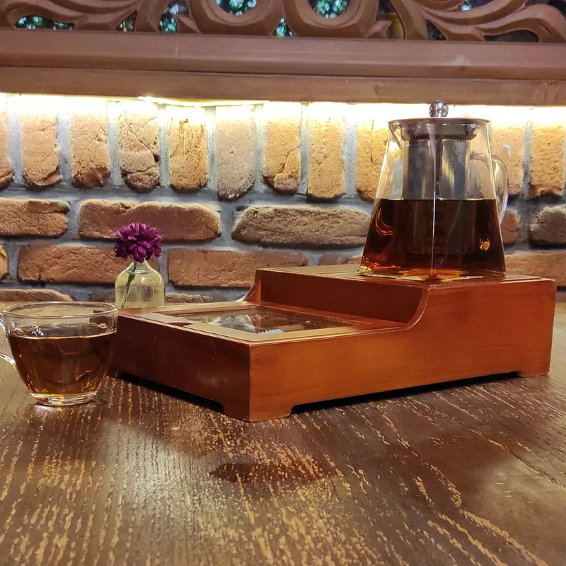 جعبه پذیرایی تی بگ وارمر پله کد 1، جنس MDF، مناسب گرم نگهداشتن دمنوش و چای، دارای 6 پارت کوچک برای تنقلات و چای و 1 پارت بزرگ برای نبات و نسکافه