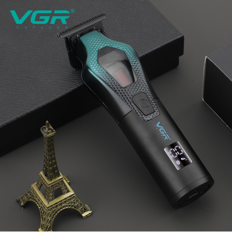 ماشین اصلاح موی سر و صورت وی جی ار مدل V-997 با موتور 11000 دور در دقیقه، باتری لیتیوم یونی 2500 میلی‌آمپر ساعت، تیغه سرامیک ضد التهاب، قابلیت تنظیم سرعت و نمایشگر میزان شارژ