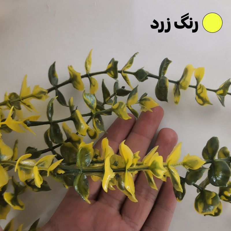 گل مصنوعی آویزی شمشادی ساده ضدآب قابل شستشو مناسب فضای باز و داخلی، ابعاد 20×20×80 سانتی‌متر، وزن 100 گرم، حدود 10 شاخه 60 تا 70 سانتی‌متر