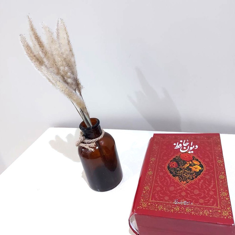 گلدان دکوری شیشه‌ای رنگی نسیم مدل 02 بسته دو عددی با ارتفاع 13 سانتی‌متر، قطر گلوگاه 2.5 سانتی‌متر، مناسب دکوراسیون و نگهداری گیاهان با قابلیت نظافت با دستمال خشک