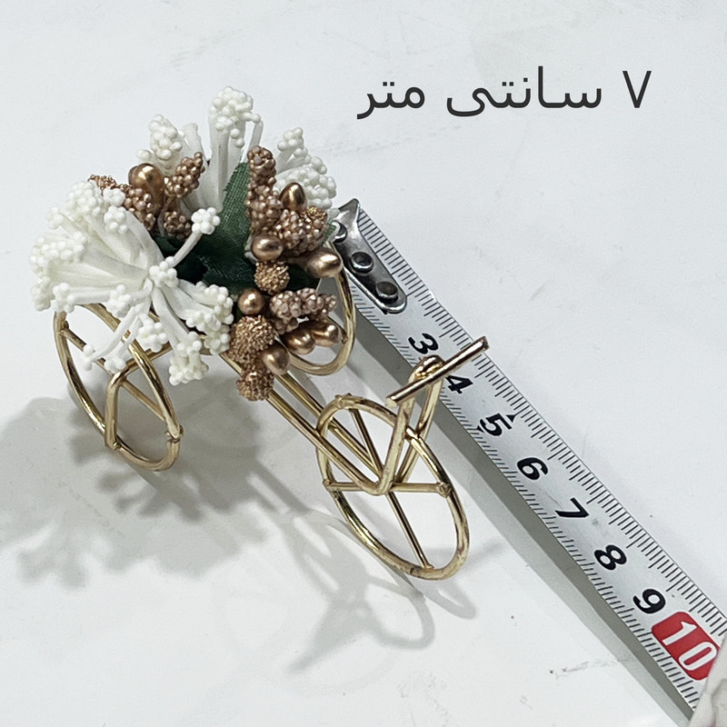 گلدان به همراه گل مصنوعی مدل دوچرخه مینیاتوری مجموعه 2 عددی