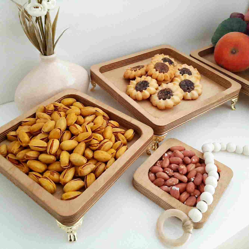 ظرف سرو چوبی پایه‌دار مدل ply05 مجموعه 5 عددی از چوب روس باکیفیت، ضدآب و بادوام مناسب آجیل‌خوری، میوه‌خوری و شکلات‌خوری، قابلیت شست‌وشو با دست و استفاده در میهمانی و پذیرایی