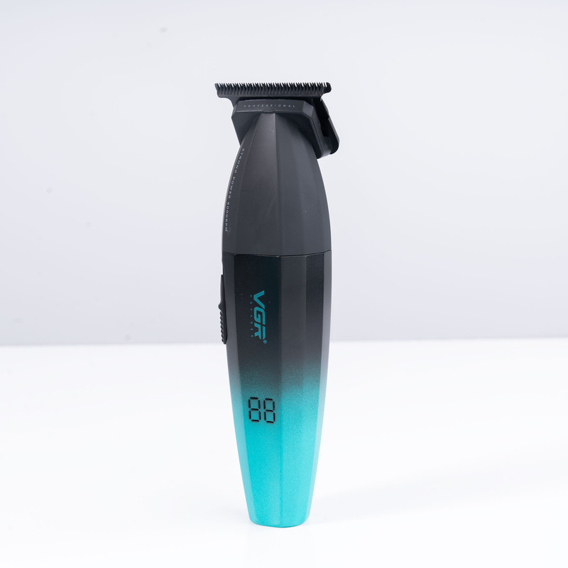 ماشین اصلاح موی سر و صورت وی جی آر مدل V-906 با تیغه سرامیکی پوشش DLC، موتور 9000 دور در دقیقه، باتری 2000 میلی‌آمپر ساعت با 240 دقیقه عمر شارژ، صفحه نمایش LED، طراحی ارگونومیک و مقاوم، قابلیت صفرزن، خط زن و حجم زن