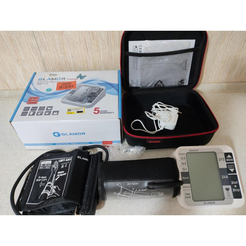 فشارسنج بازویی دیجیتال گلامور مدل TMB-1112 دو کاربره با حافظه 250 رکورد، تشخیص آریتمی، فناوری WMI، منبع انرژی برق و باتری، کاف فنری و ساده برای بازوی 22 تا 42 سانتی‌متر، نمایش میانگین نتایج و خاموشی خودکار
