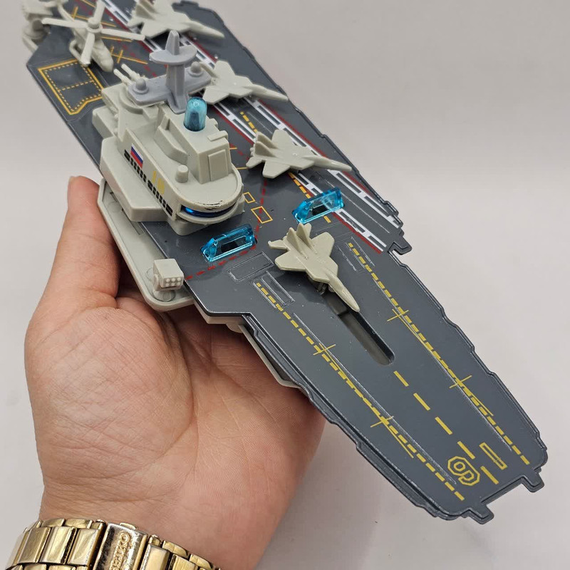 ناو هواپیمابر ناب سل مدل فلزی چراغدار موزیکال کد The Musical Lighted Aircraft Carrier به همراه 4 عدد هواپیما و یک عدد هلیکوپتر