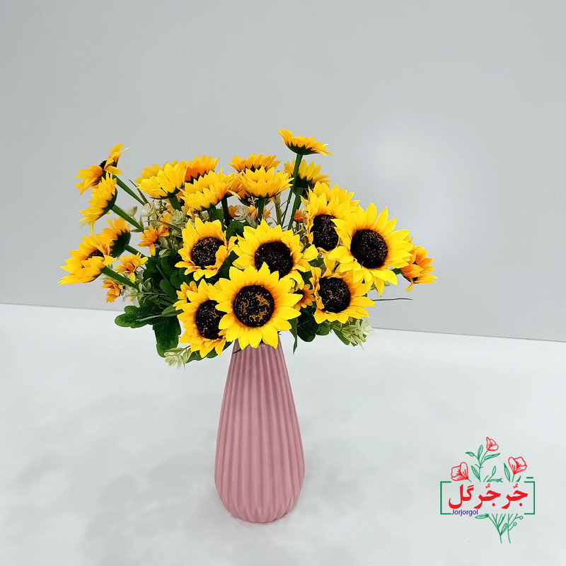 گل مصنوعی جُرجُرگل مدل بوته آفتابگردان با 10 بازو، مناسب نصب رومیزی و دیواری، ابعاد 20x20x40 سانتی‌متر و وزن 150 گرم