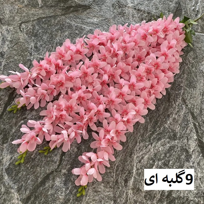 گل مصنوعی مدل آویز ارکیده با 5 شاخه گلدار، قابل تنظیم، قابل شستشو و انعطاف پذیر، مناسب فضای باز و گل‌های آپارتمانی با نصب دیواری، آویزی و ایستاده، ابعاد 85x23x5 سانتی‌متر و وزن 110 گرم