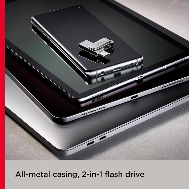 فلش مموری سن دیسک مدل Dual Drive Luxe ظرفیت 128 گیگابایت با طراحی چرخشی، دو رابط USB Type-C و USB Type-A، سرعت انتقال 150 مگابایت بر ثانیه، بدنه فلزی و سازگار با موبایل، تبلت، کامپیوتر و تلویزیون