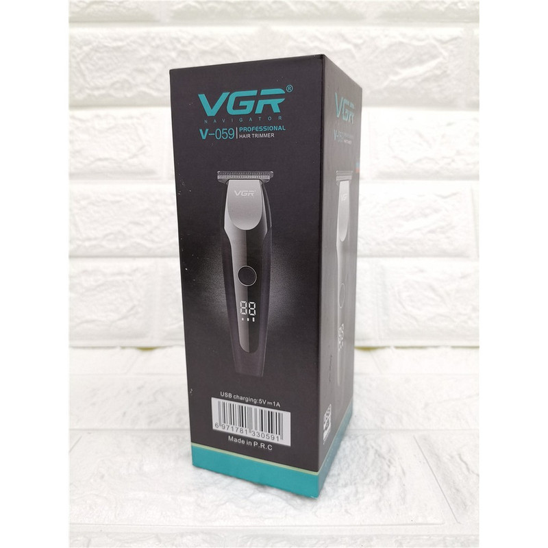 ماشین اصلاح موی صورت و بدن وی جی ار مدل V-059 با تیغه استیل ضد زنگ خودتیز شونده، باتری لیتیوم یونی با 150 دقیقه زمان استفاده، نمایشگر دیجیتال، تنظیم سرعت 3 مرحله‌ای و 6 عدد شانه سایز 1 تا 6 میلی‌متر