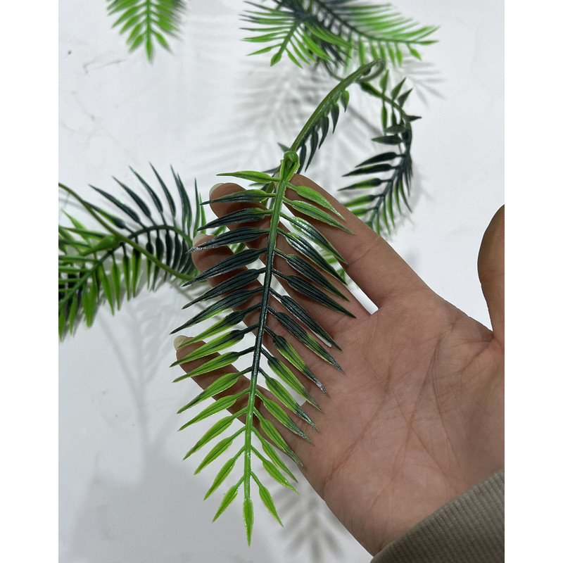 گل مصنوعی با ریسه سوزنی مناسب دکوراسیون، ابعاد 180×10×10 سانتی‌متر، وزن 100 گرم