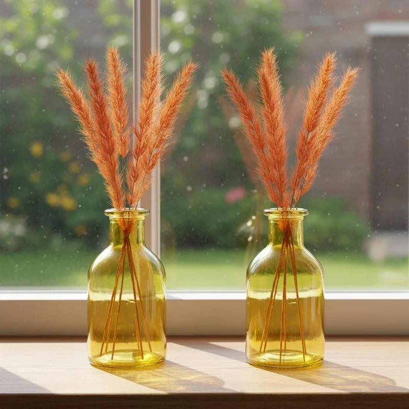 گلدان دکوری شیشه‌ای رنگی نسیم مدل 02 بسته دو عددی با ارتفاع 13 سانتی‌متر، قطر گلوگاه 2.5 سانتی‌متر، مناسب دکوراسیون و نگهداری گیاهان با قابلیت نظافت با دستمال خشک
