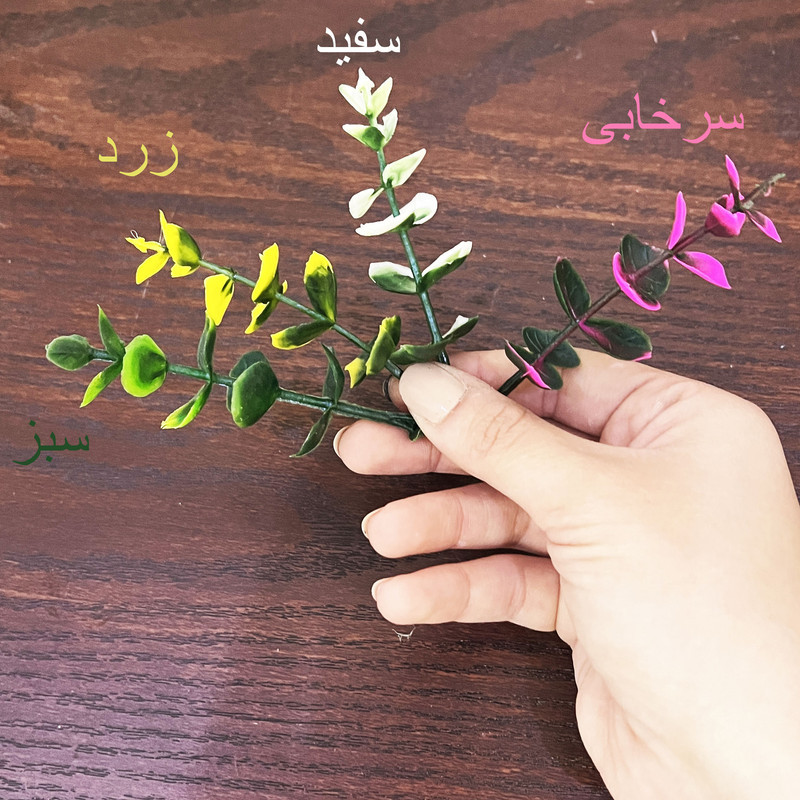 گل مصنوعی شمشاد پاکوتاه با ابعاد 15 × 15 × 70 سانتی‌متر و وزن 100 گرم