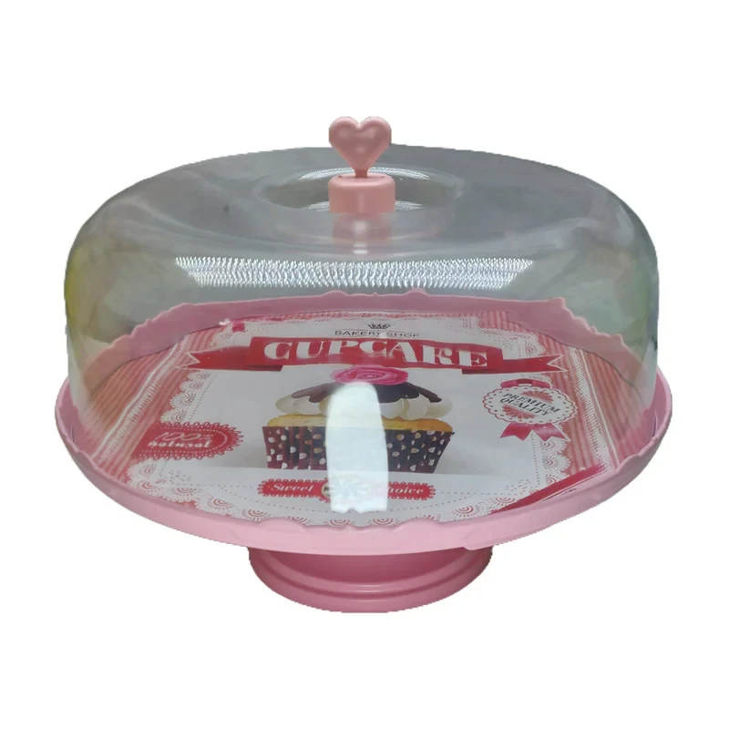 ظرف سرو کیک طرح کاپ‌کیک با درپوش شفاف، پایه ثابت و دستگیره قلبی‌شکل برای نمایش و نگهداری کیک و دسر