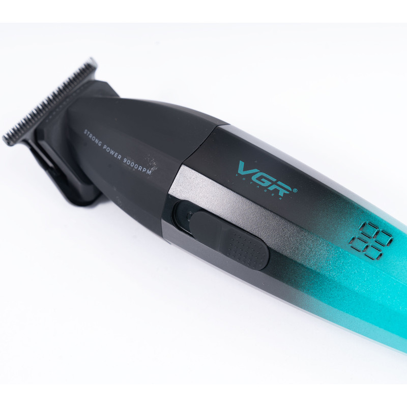ماشین اصلاح موی سر و صورت وی جی آر مدل V-906 با تیغه سرامیکی پوشش DLC، موتور 9000 دور در دقیقه، باتری 2000 میلی‌آمپر ساعت با 240 دقیقه عمر شارژ، صفحه نمایش LED، طراحی ارگونومیک و مقاوم، قابلیت صفرزن، خط زن و حجم زن