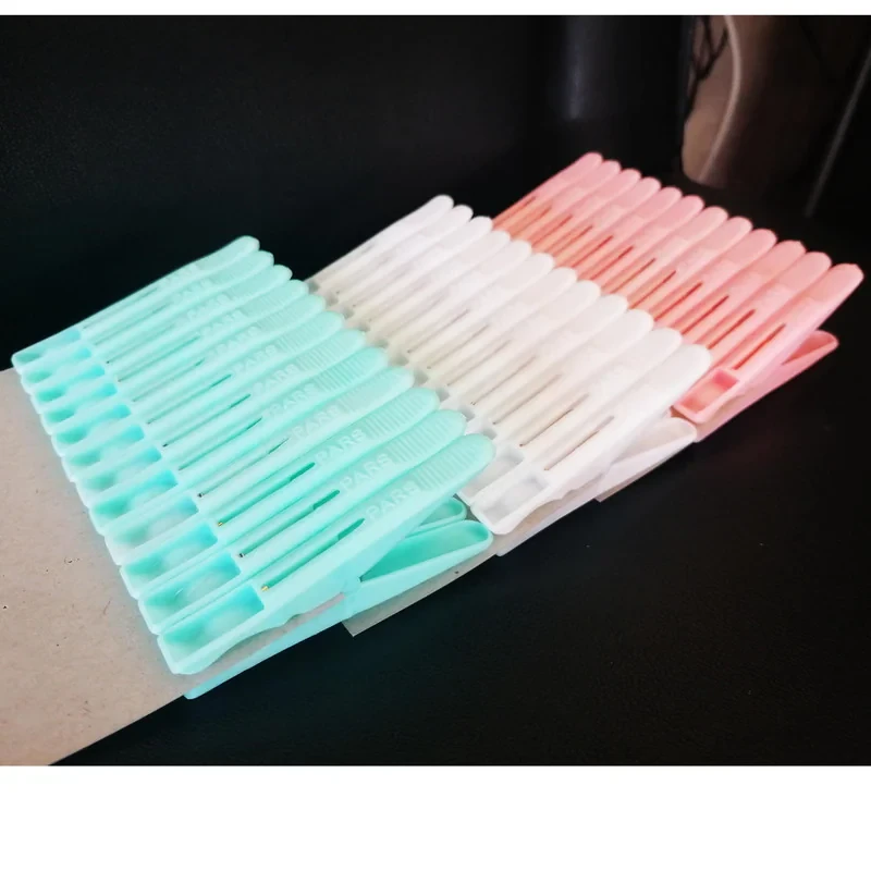 گیره لباس سناپارت مدل SP-P12 بسته 12 عددی