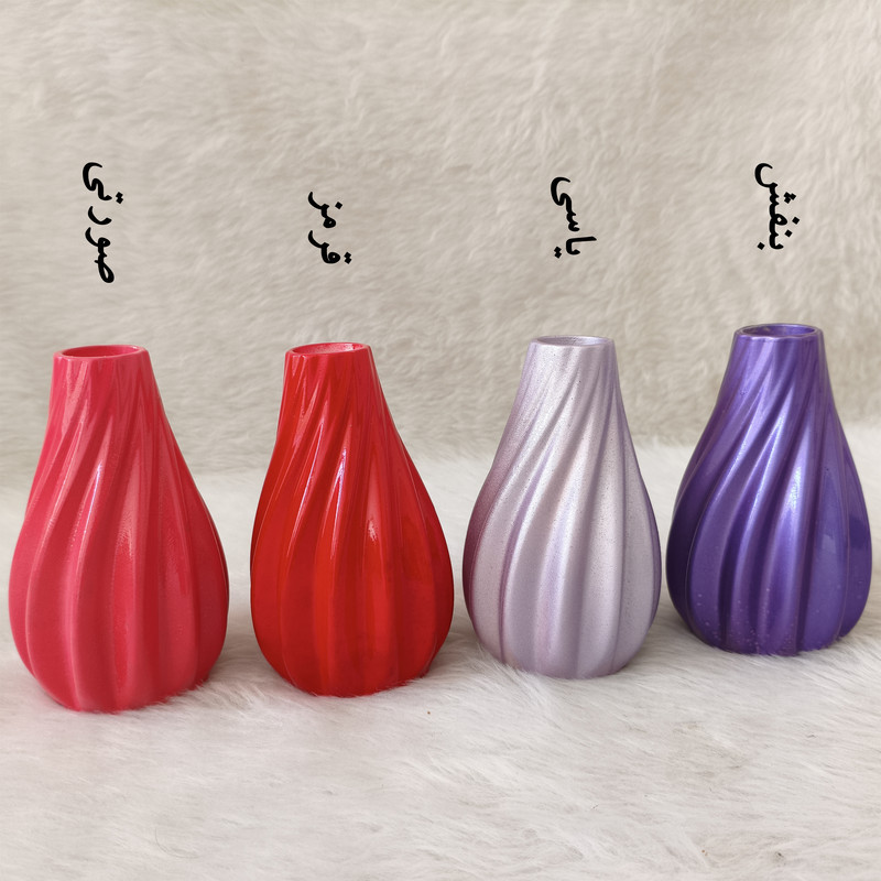 گلدان دکوری رومیزی مدل پیچک مناسب گل‌های آپارتمانی با ابعاد 15x8x8 سانتی‌متر و پوشش براق محافظ و طراحی موج‌دار زیبا