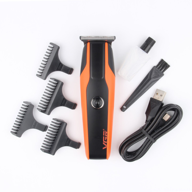 ماشین اصلاح موی سر و صورت وی جی آر مدل V-999 با تیغه استیل پیشرفته، اصلاح دقیق 0.01 میلی‌متر، استفاده خشک و مرطوب، باتری شارژی 90 دقیقه کارکرد و 4 شانه تنظیم طول