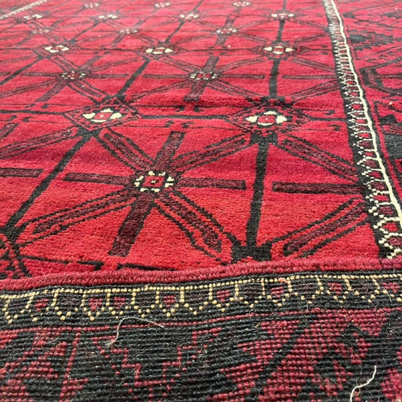 فرش دستبافت شش متری مدل بلوچ کد Nkpa.ha.q23 زمینه قرمز