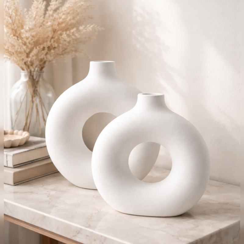 گلدان دکوری مدل donut بسته 2 عددی رومیزی سفالی بیضی مناسب گل‌های آپارتمانی، ابعاد 21×21×21 سانتی‌متر، وزن 200 گرم، مناسب گل خشک و تزئینی