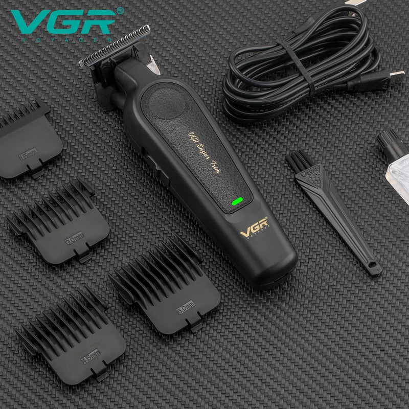 ماشین اصلاح موی سر و صورت وی جی آر مدل V-995 با تیغه کربن استیل، باتری لیتیوم یون 2000 میلی‌آمپر ساعت، شارژ USB، قابلیت تنظیم سرعت و طراحی ارگونومیک و سبک