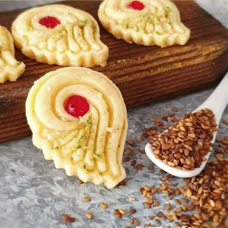 کاتر شیرینی پزی به گز مدل پر طاووس مجموعه 2 عددی