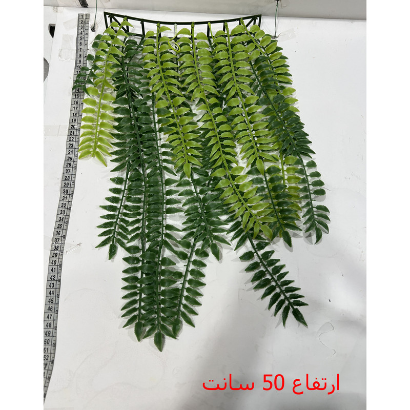 گل مصنوعی دیوارپوش سرخس با ابعاد 25x10x50 سانتی‌متر و وزن 100 گرم