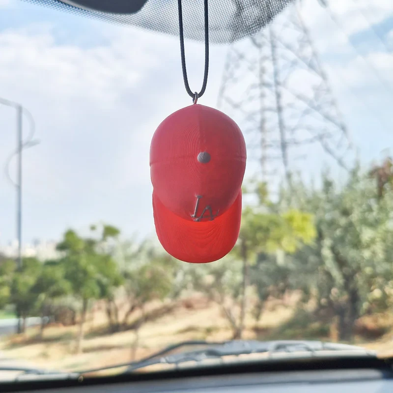 آویز تزئینی خودرو مدل کلاه کپ کد PI