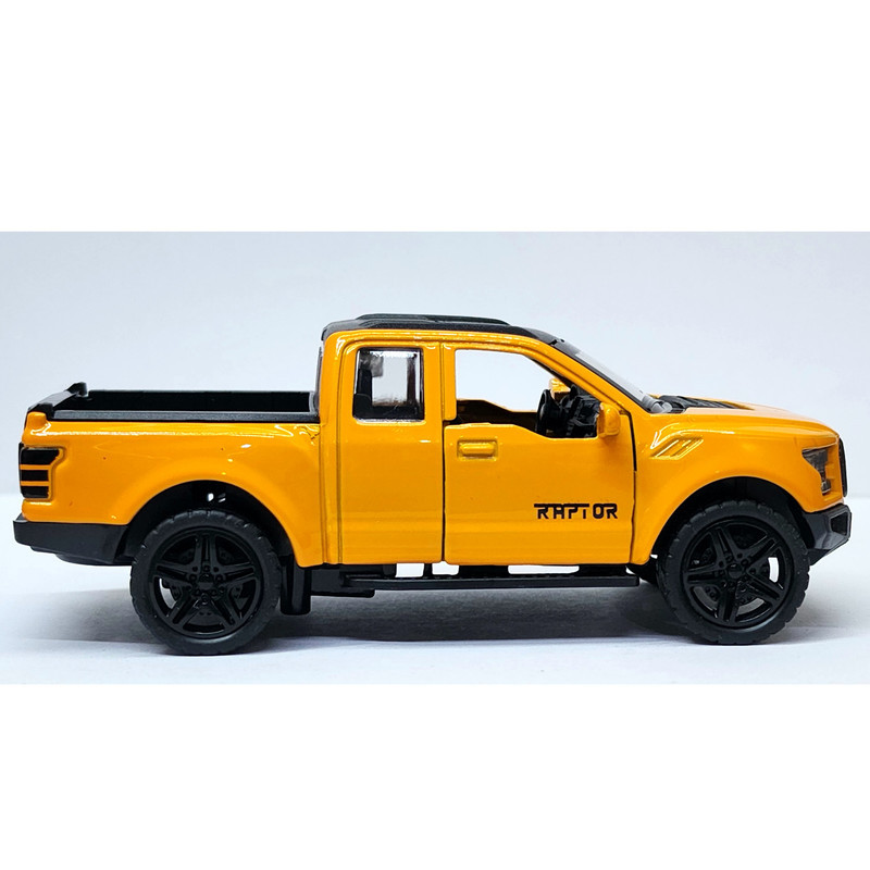 ماشین بازی آفرود فلزی طرح فورد RAPTOR عقب‌کش با در و صندوق بازشو، چراغ و افکت صوتی، طراحی دقیق و حرکت جلو و عقب