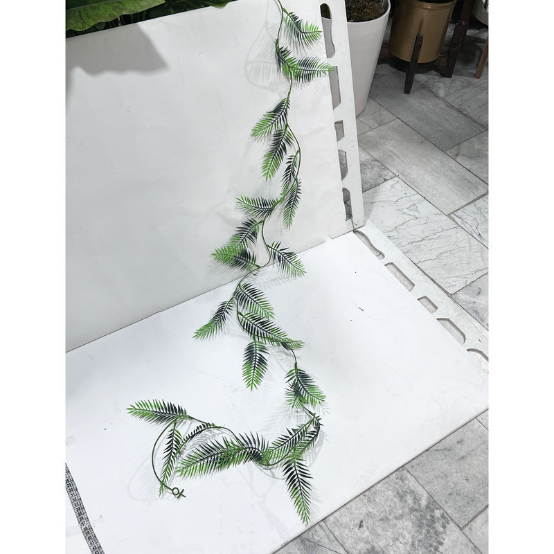 گل مصنوعی با ریسه سوزنی مناسب دکوراسیون، ابعاد 180×10×10 سانتی‌متر، وزن 100 گرم