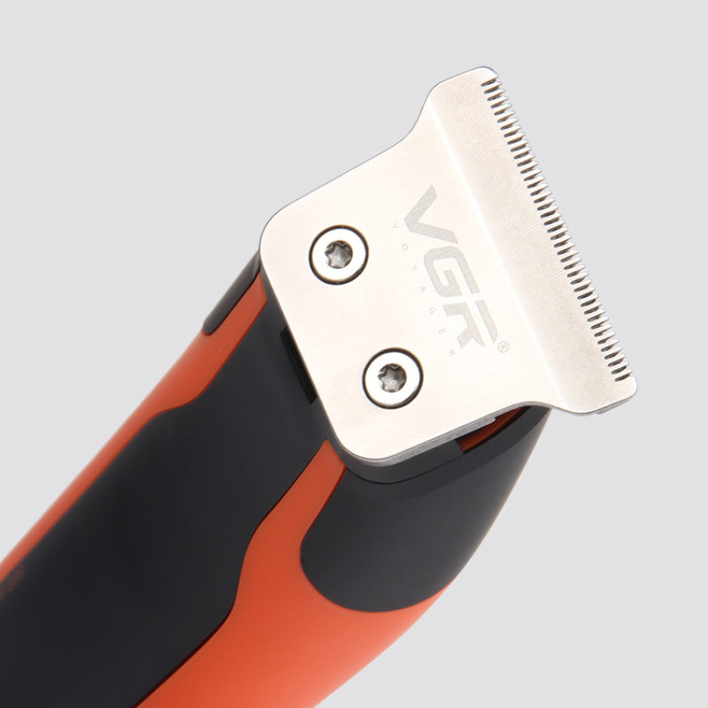 ماشین اصلاح موی سر و صورت وی جی آر مدل V-999 با تیغه استیل پیشرفته، اصلاح دقیق 0.01 میلی‌متر، استفاده خشک و مرطوب، باتری شارژی 90 دقیقه کارکرد و 4 شانه تنظیم طول